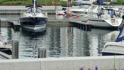 Skøn Tuborg lejlighed i første række til vandet.